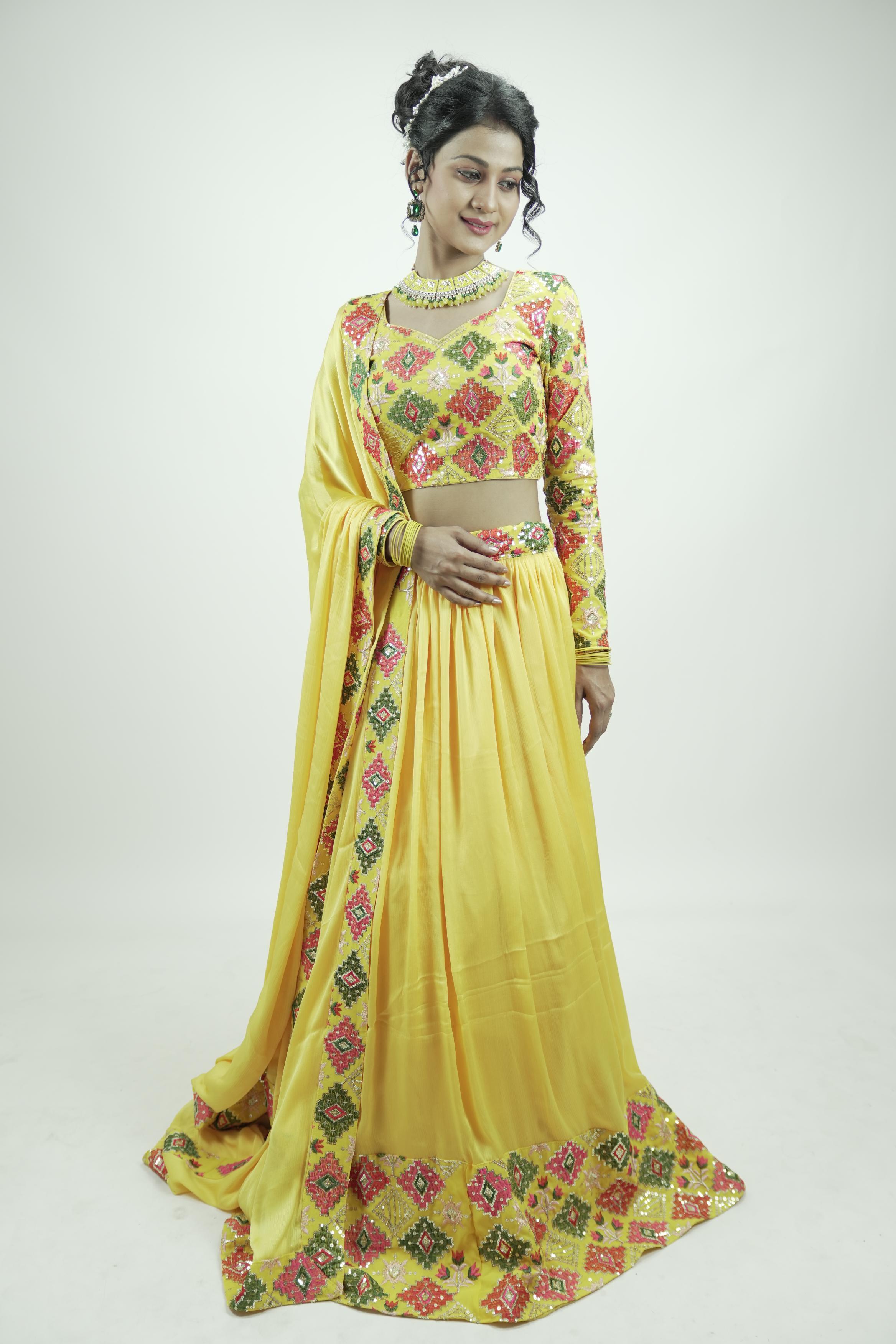 Yellow embroidery sequinned Lahenga set