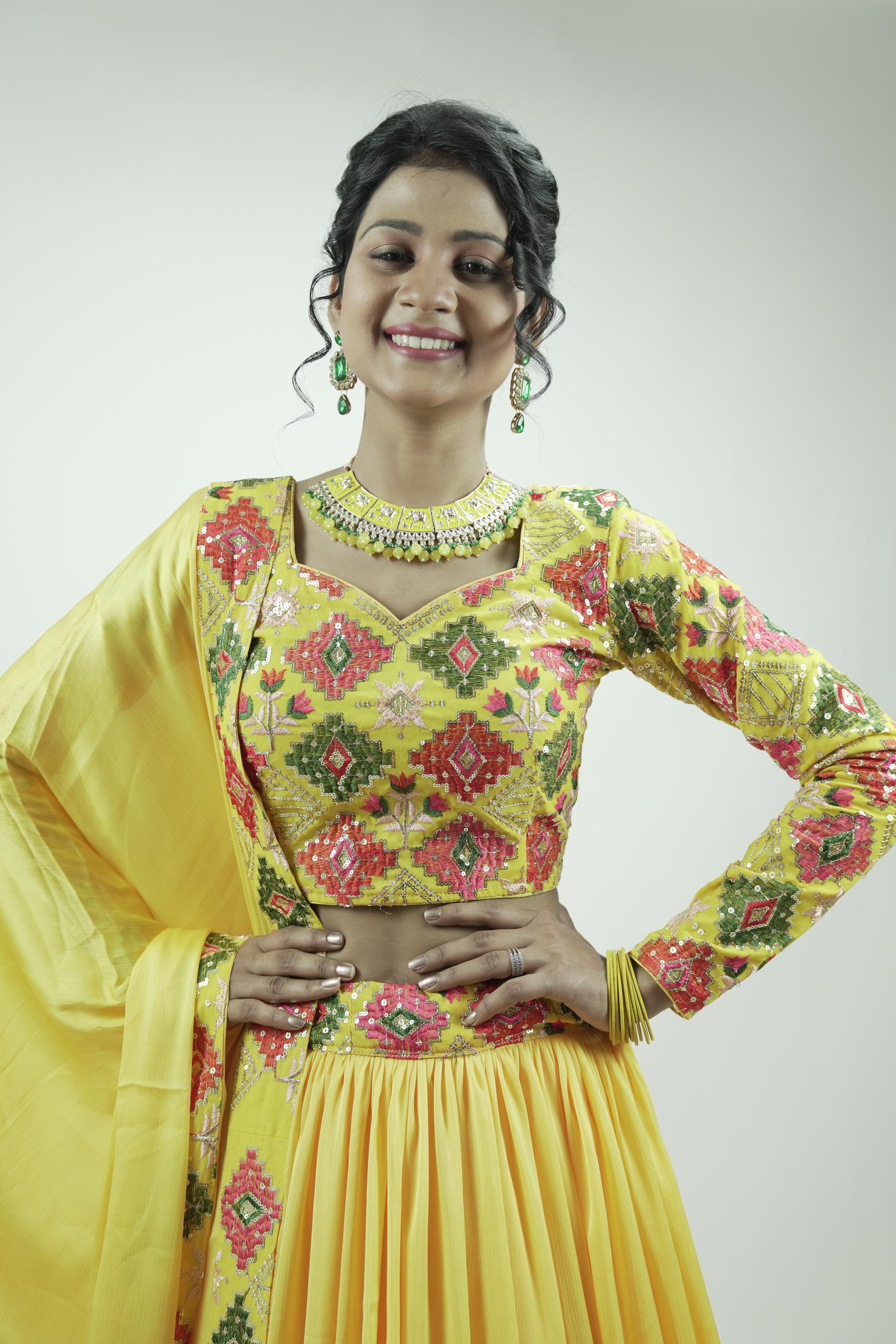 Yellow embroidery sequinned Lahenga set