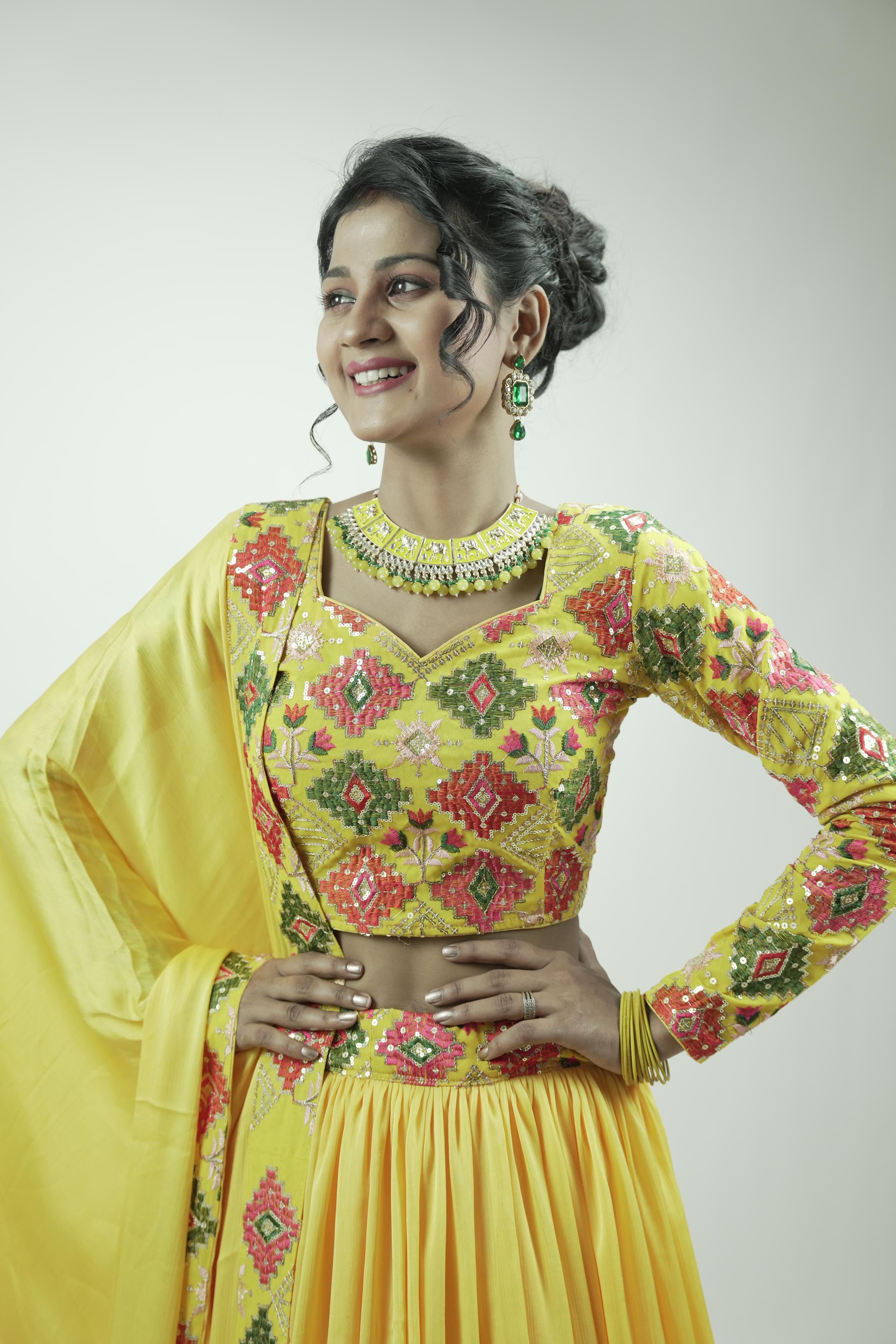 Yellow embroidery sequinned Lahenga set