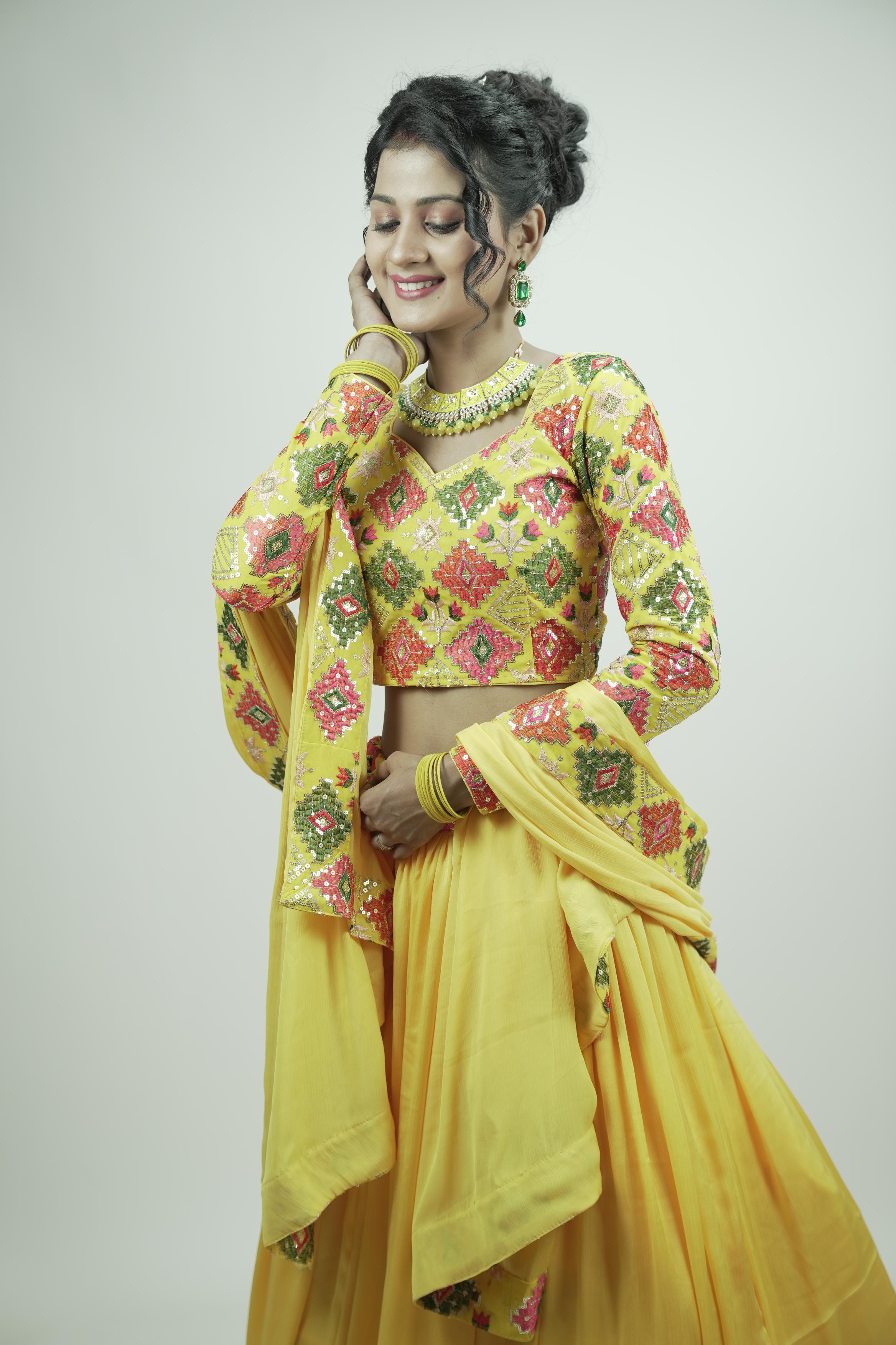 Yellow embroidery sequinned Lahenga set